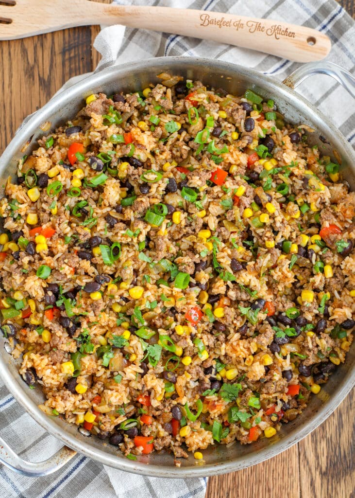 Mexican Fried Rice is filled with Ground Beef, Bell Peppers, Black Beans, and Corn