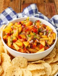 diced peaches, onion, and jalapeno salsa in white bowl