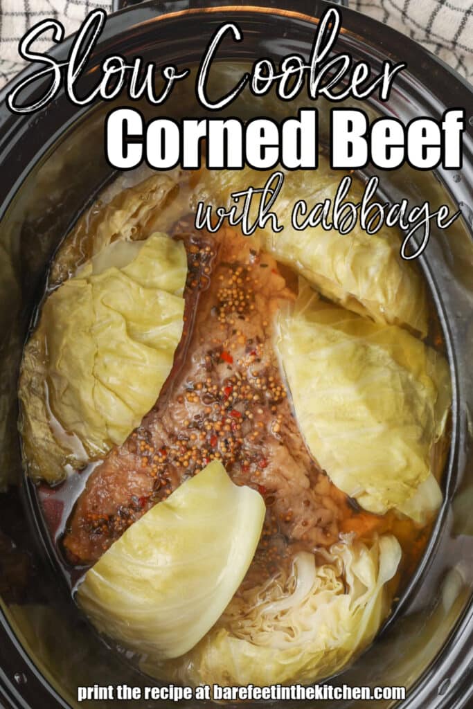 crockpot filled with corned beef and wedges of cabbage 