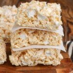 stacked rice krispy treats with parchments