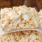 rice crispy treats with coconut on parchment