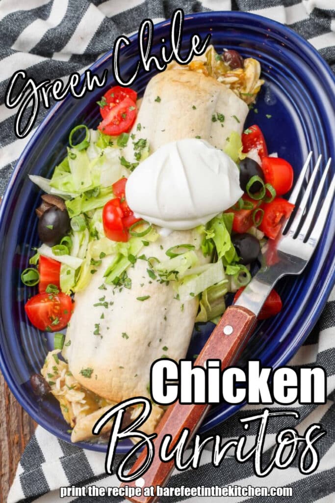 chicken and green chile burritos on blue plate with fork