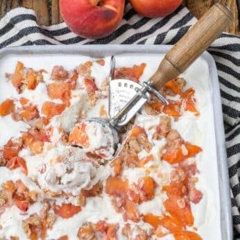 peach crisp ice cream in pan with scoop