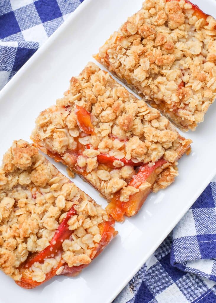 Oatmeal Bars with Peaches on white platter