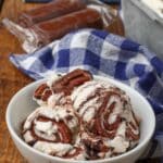 swiss rolls with ice cream on wooden table