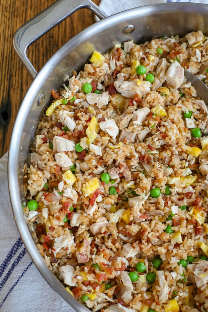 Dinner of fried rice with chicken and bacon