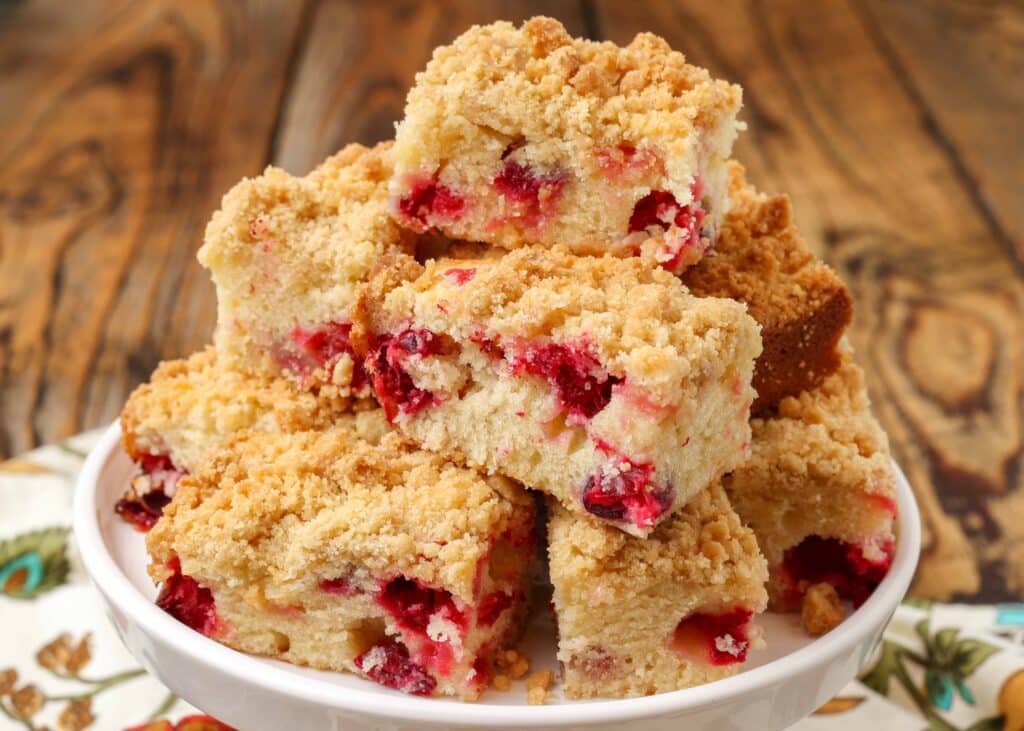 Cranberry coffeecake stacked on cake stand