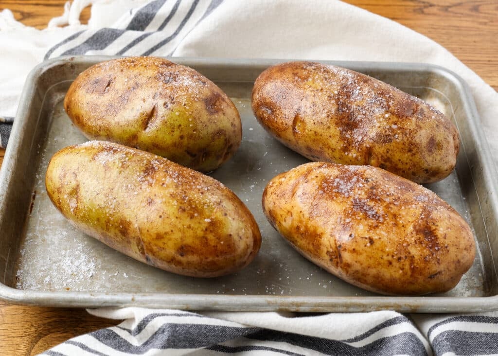 The potatoes are oiled and salted and ready to go into the oven.