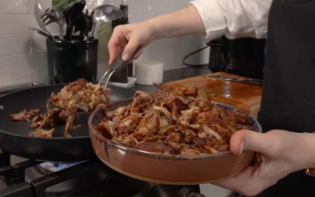 transferring the meat to a plate