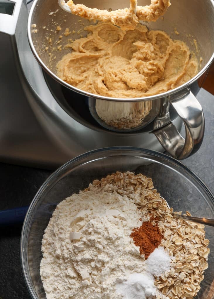 adding the dry ingredients to the wet ingredients for cookies