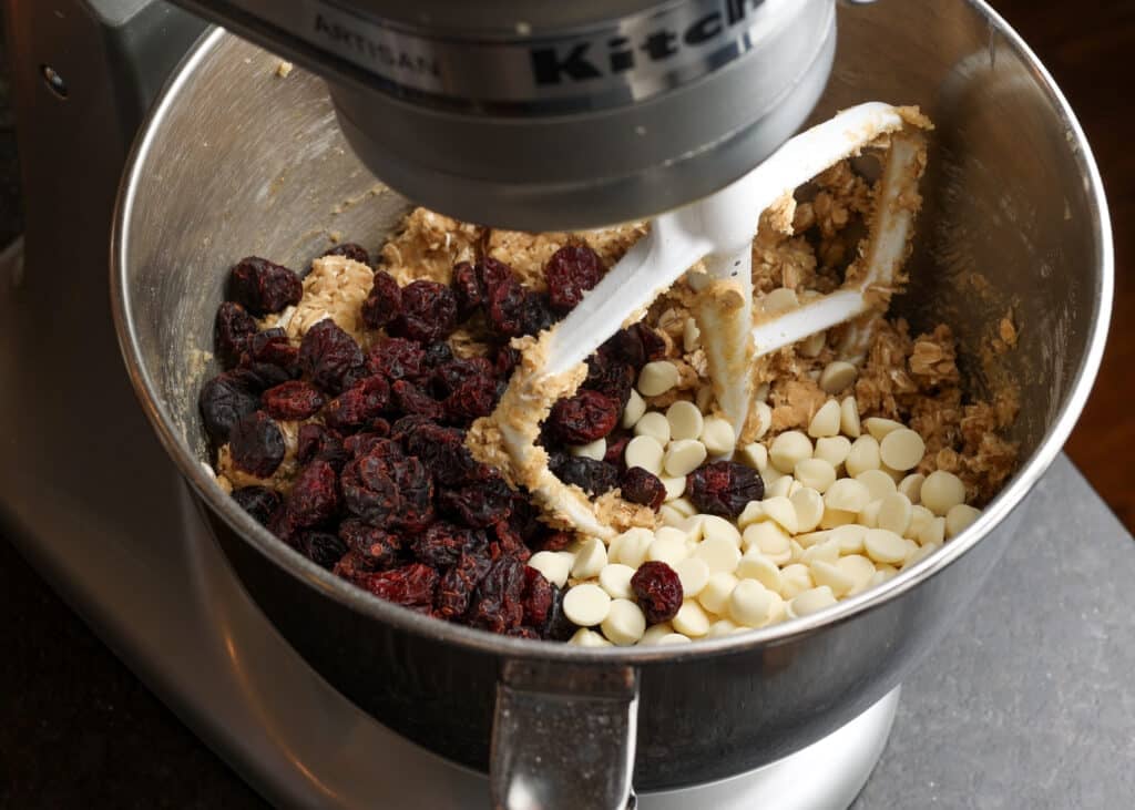 dried cranberries and white chocolate chips in cookie dough