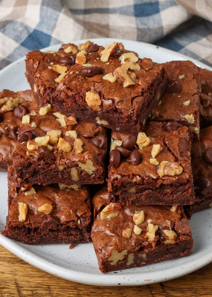 A close up shot of the brownies showing all the walnut pieces in top and within the brownie edges.