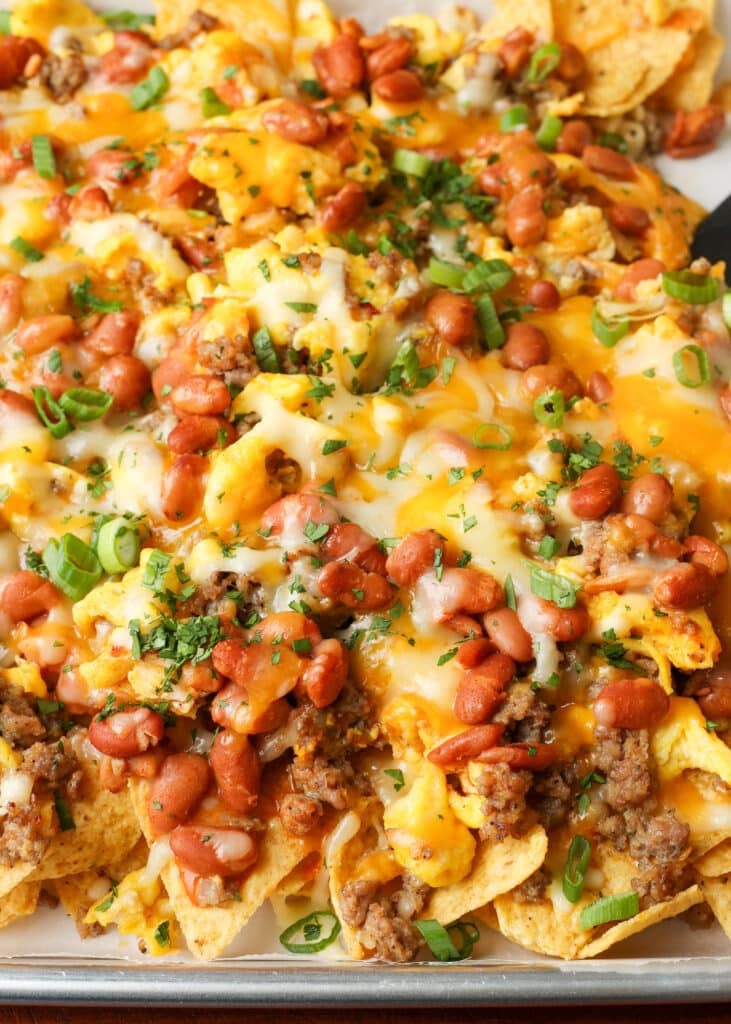 close up of breakfast nachos on sheet pan