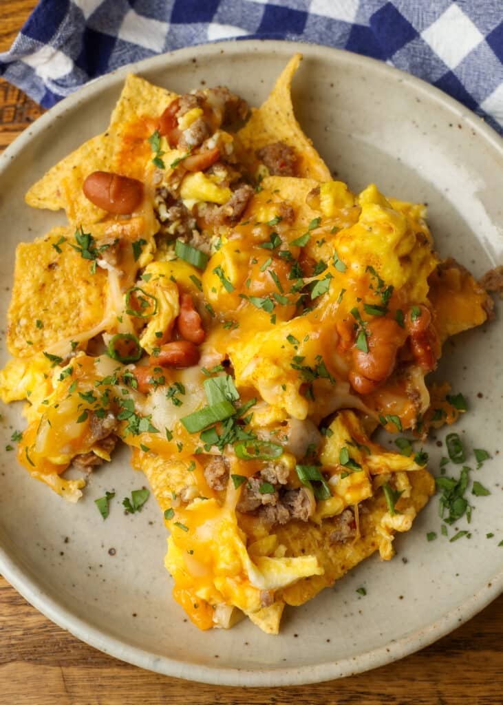 overhead shot of nachos on plate on table