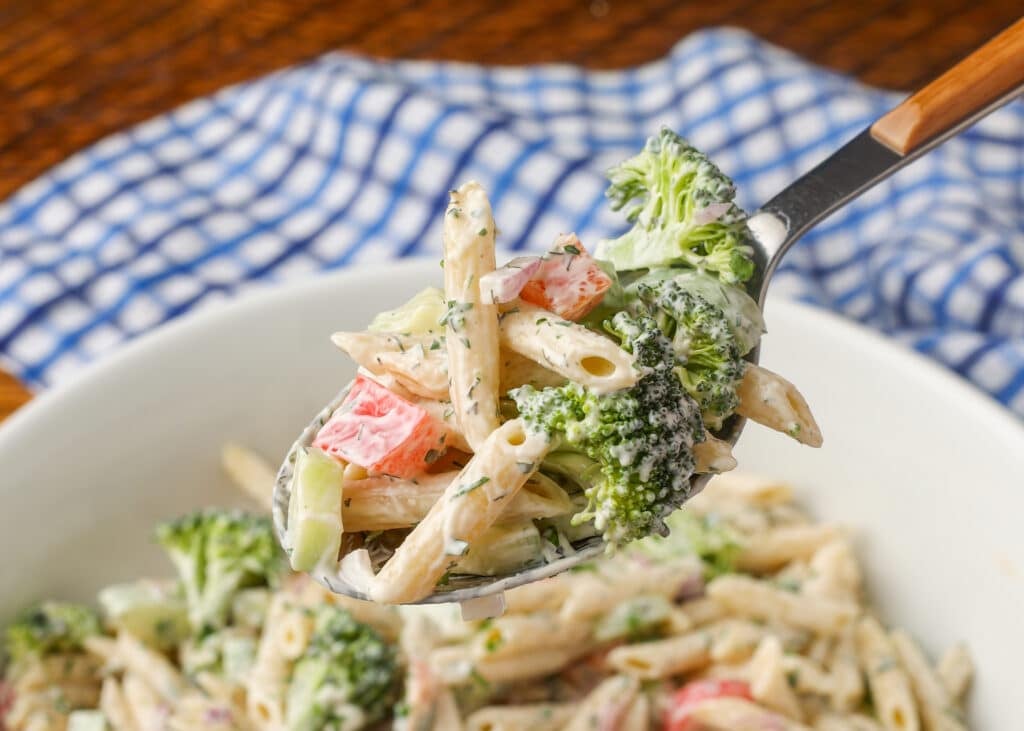 close up of spoonful of ranch pasta salad
