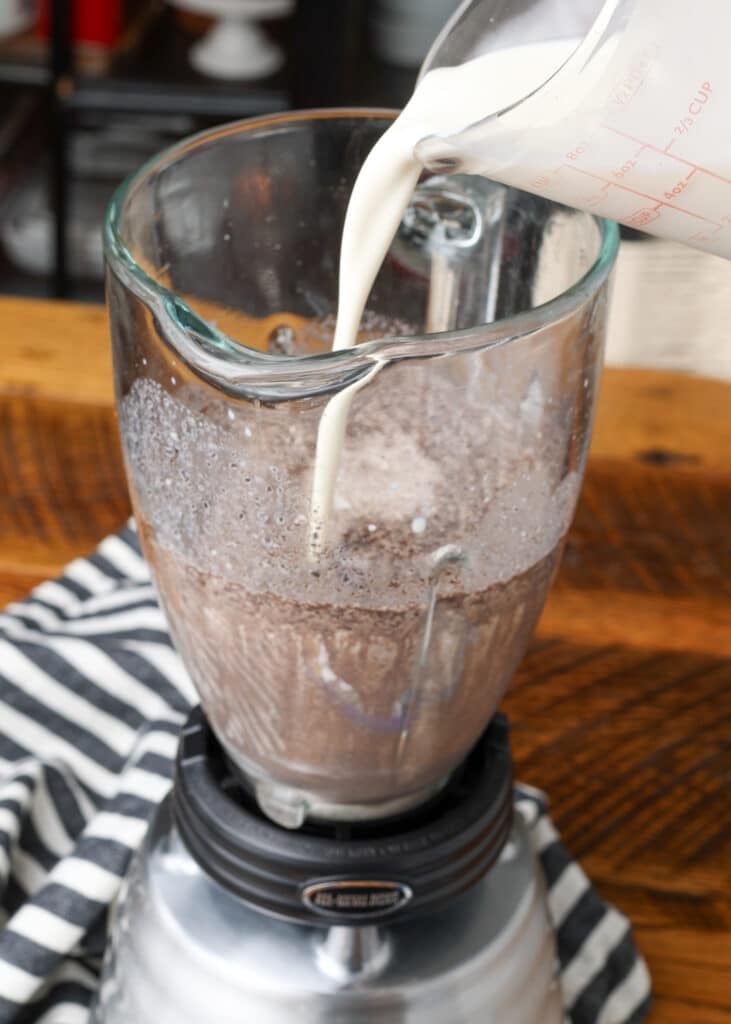 Oreo Ice Cream - Barefeet within the Kitchen 58 pouring cream into blender with oreos and milk