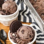 ice cream scooped into bowl with extra Oreo standing up in bowl