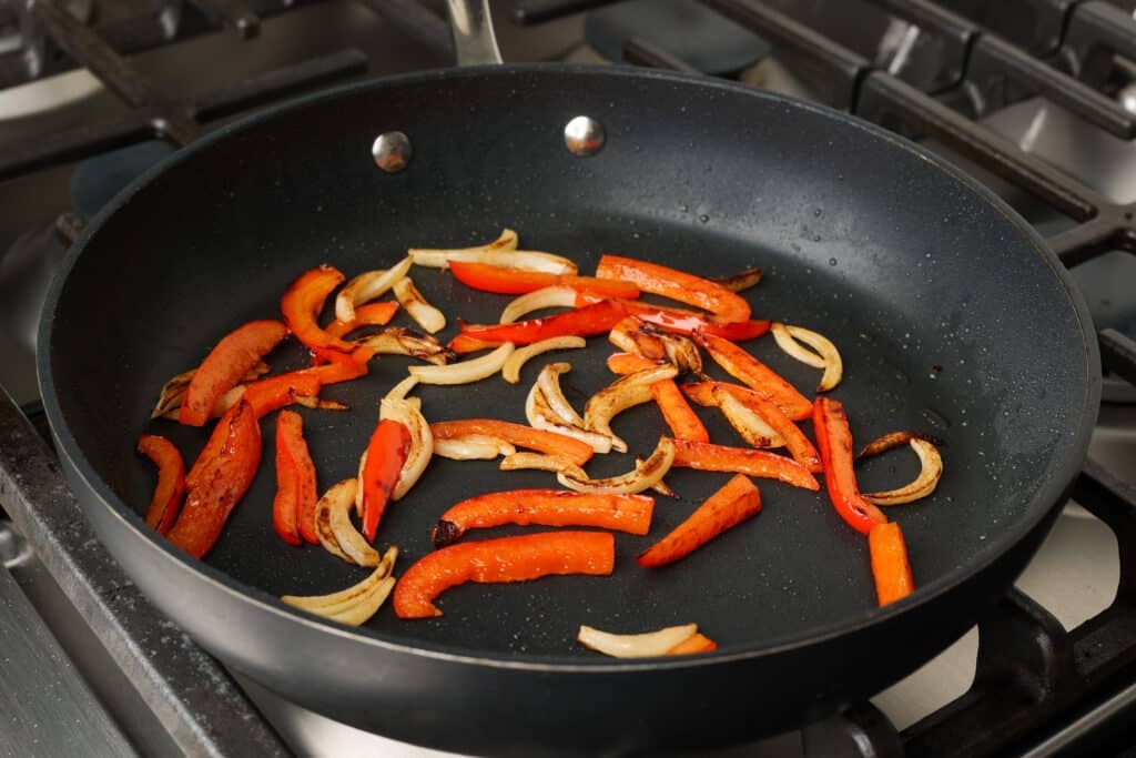sauteeing peppers and onions in nonstick skillet