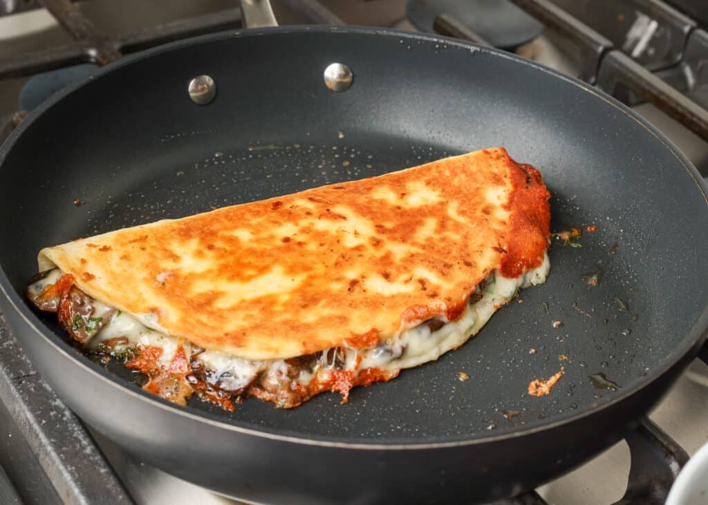 toasted quesadilla in skillet