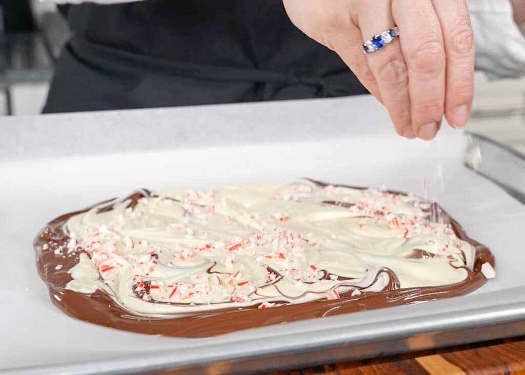 sprinkling bark with crushed candy canes