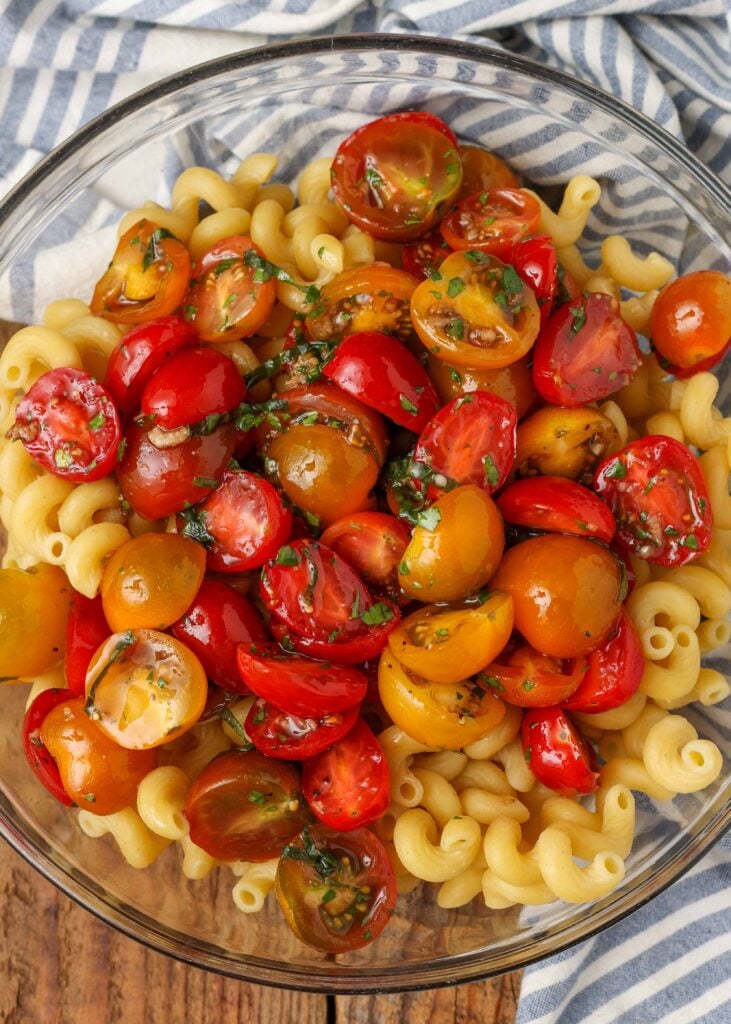 marinated tomatoes over pasta