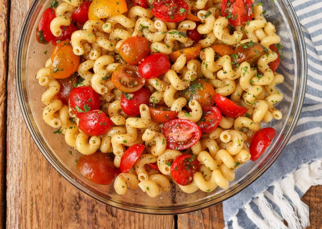 close up of pasta salad with tomatoes