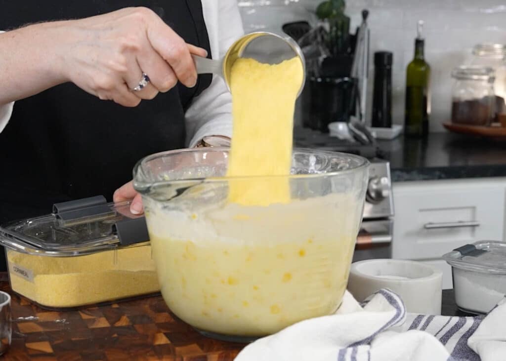 adding dry ingredients to wet ingredients